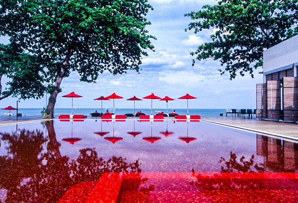 The Library Resort's red swimming pool is a real stunner in Ko Samui.